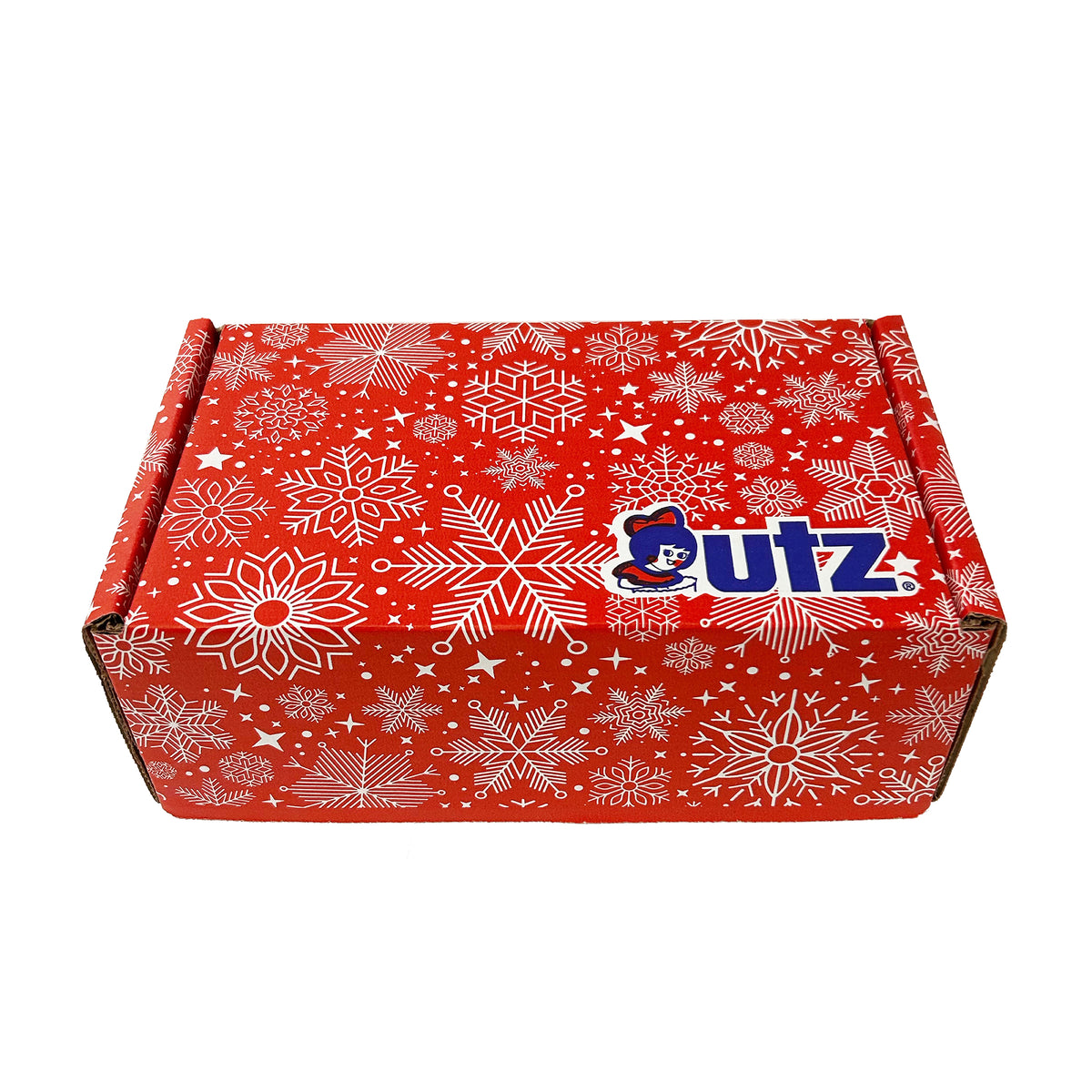 Small gift box, closed: red with an allover white snowflake pattern and the Utz logo on the lid