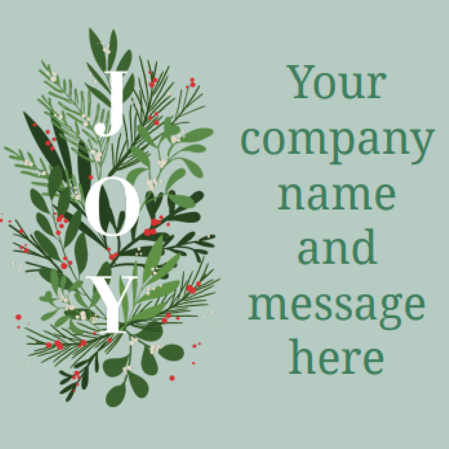 Sage green gift label with JOY in white over pine sprigs and red berries, beside a spot for your company name and message